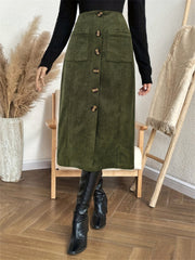 Army green corduroy button-down A-line midi skirt with front pockets and wooden buttons.