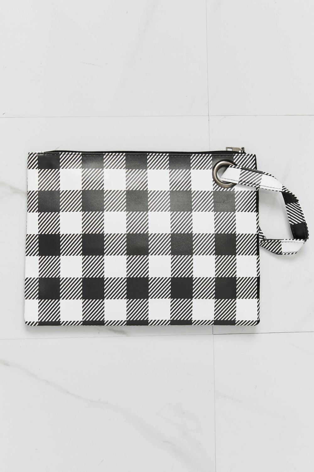 Black and white gingham wristlet pouch with metal ring detail