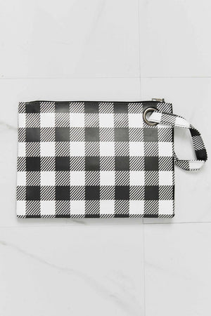Black and white gingham wristlet pouch with metal ring detail