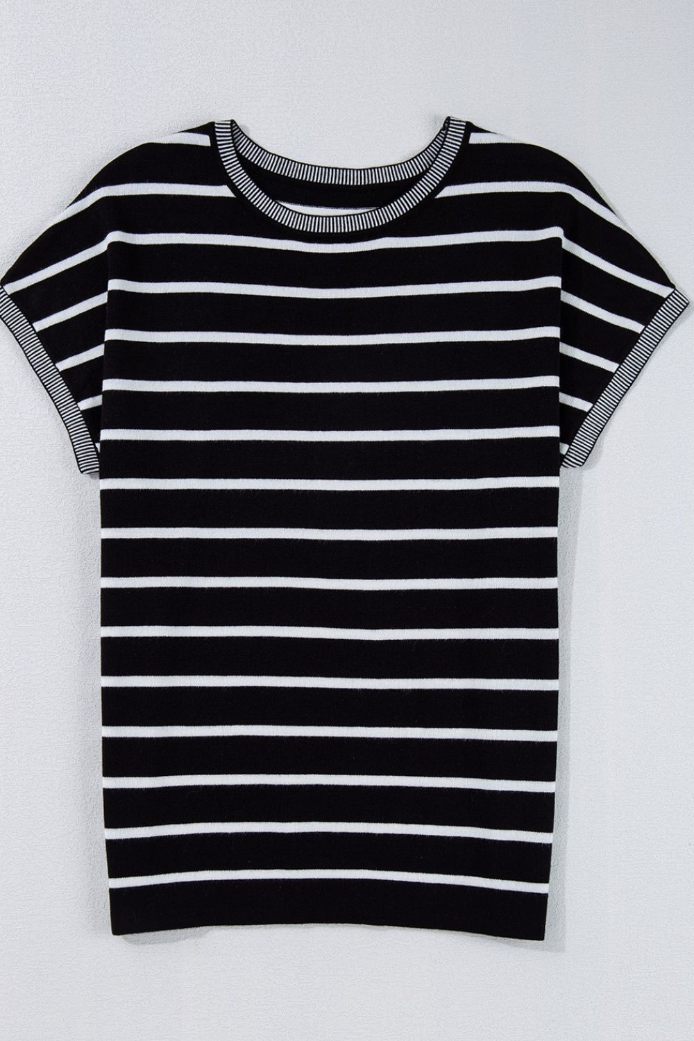 Black and white striped boxy tee with contrast ribbed trim on neckline and sleeves.