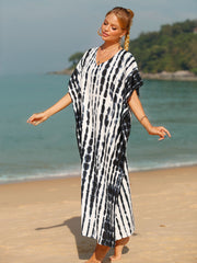 Black tie-dye maxi kaftan dress with vertical stripes and V-neck.