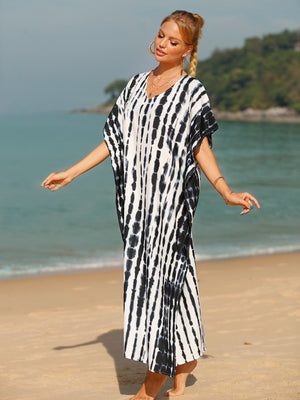 Black tie-dye maxi kaftan dress with vertical stripes and V-neck.