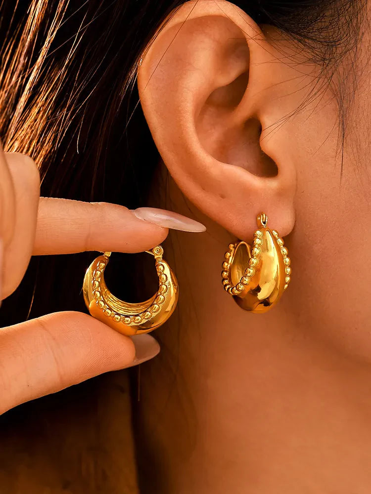 Gold-tone crescent earrings with beaded edges, 18K gold-plated
