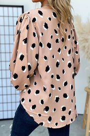 Blouson sleeve spot print silk blouse in Dust Storm with black and white spots.