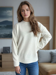 Cream textured knit crew neck pullover sweater with ribbed cuffs and hem