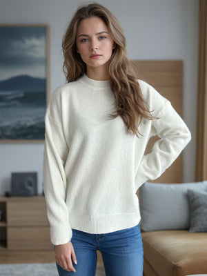 Cream textured knit crew neck pullover sweater with ribbed cuffs and hem