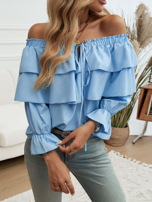 Cerulean tiered ruffle off-shoulder blouse with tie neck and bell sleeves