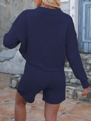 Dark Blue textured knit polo short set with long sleeves and collared neckline.