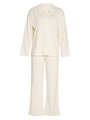 Cream ribbed knit loungewear set with button-up shirt and wide-leg pants.