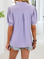 Purple eyelet puff sleeve collar top with a textured pattern.