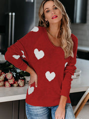 Deep Red heart motif raglan knit sweater with a scoop neck.