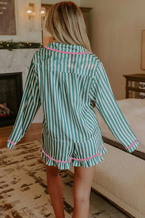 Green and white striped pajama set with pink trim and ruffled shorts.