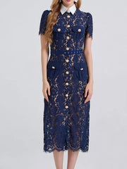 Navy lace midi dress with white collar, gold buttons, short sleeves, and pockets.