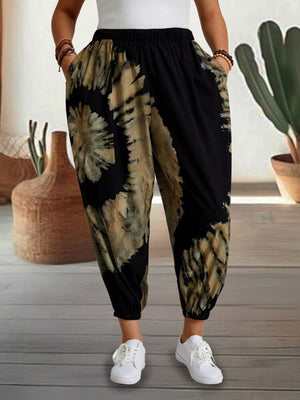 Tie-dye harem trousers with elastic waist and pockets in black and tan.
