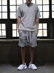 Men's grey ribbed t-shirt and drawstring shorts set with white accents