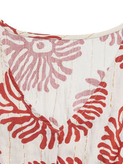 Floral V-neck maxi dress with red coral print and gold pinstripes.