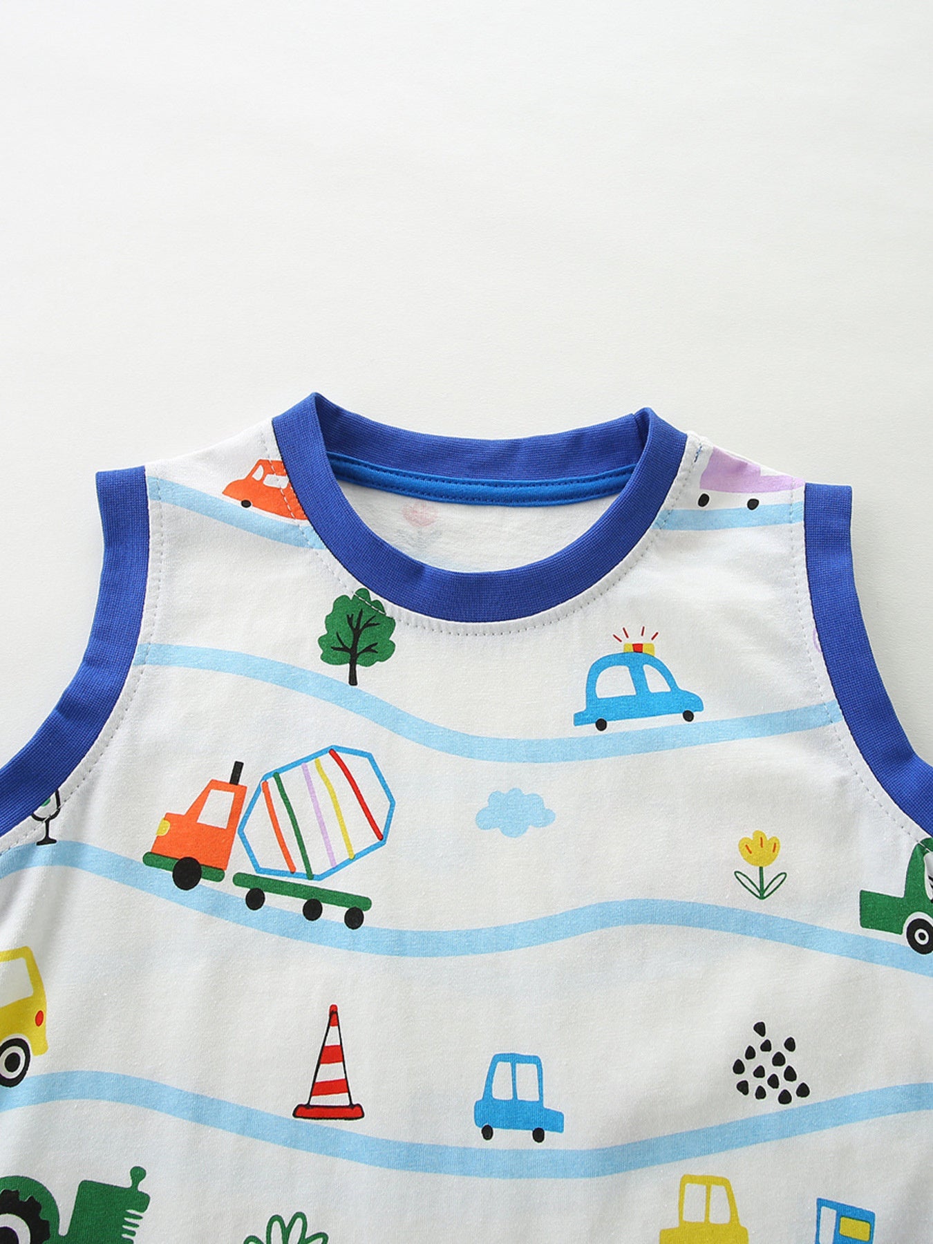 Toddler blue trim cotton tank top with playful vehicle print