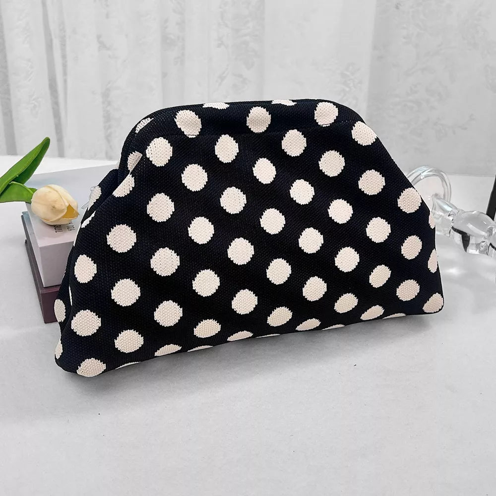 Knit clutch bag with black and white polka dots