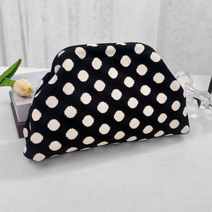 Knit clutch bag with black and white polka dots