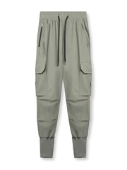 Sage technical cargo joggers with zip pockets and ribbed cuffs