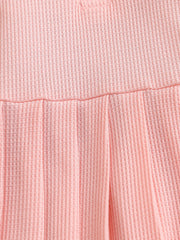 Pink waffle knit baby dress with gathered skirt detail