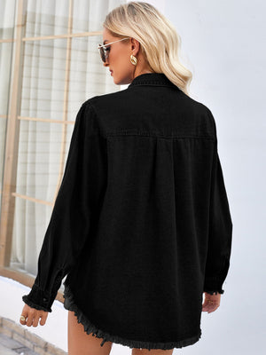 Black denim shirt with sequin embellishments, long sleeves, and frayed hem.