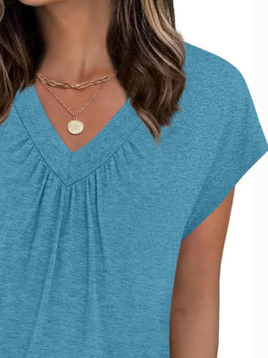 Blue ruched V-neck t-shirt with short sleeves and a relaxed fit.