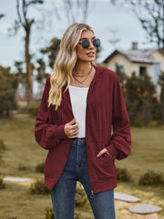 Textured knit dolman sleeve hoodie in wine with zip front and pockets.