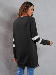 Black sweatshirt dress with white varsity stripes on sleeves, crew neck, long sleeves, polyester