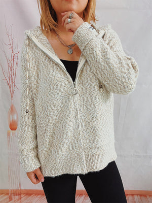 Speckled knit relaxed zip-up hoodie in a light neutral color with a herringbone pattern.