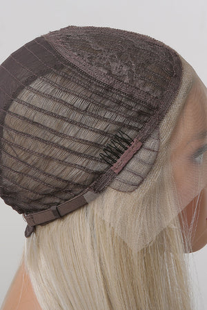 Luxe Platinum Lace Front Wig cap construction with adjustable straps and comb detail, blonde hair.