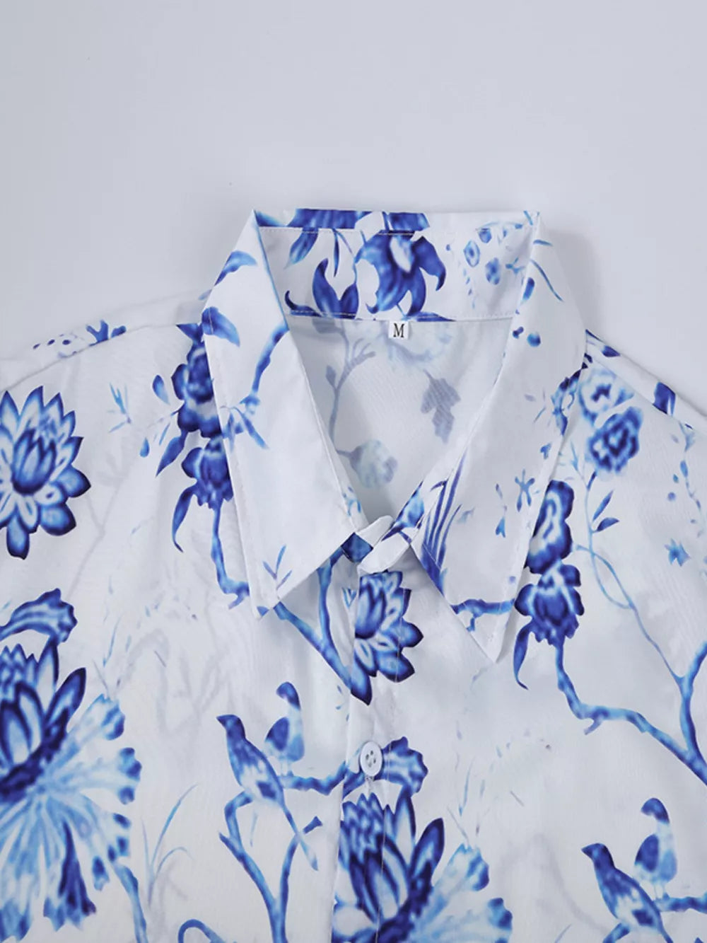 Men's Full Size Floral Print Button-down Shirt in Light Blue, model styling view