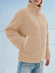 Tan sherpa stand-collar jacket with zip front and pockets