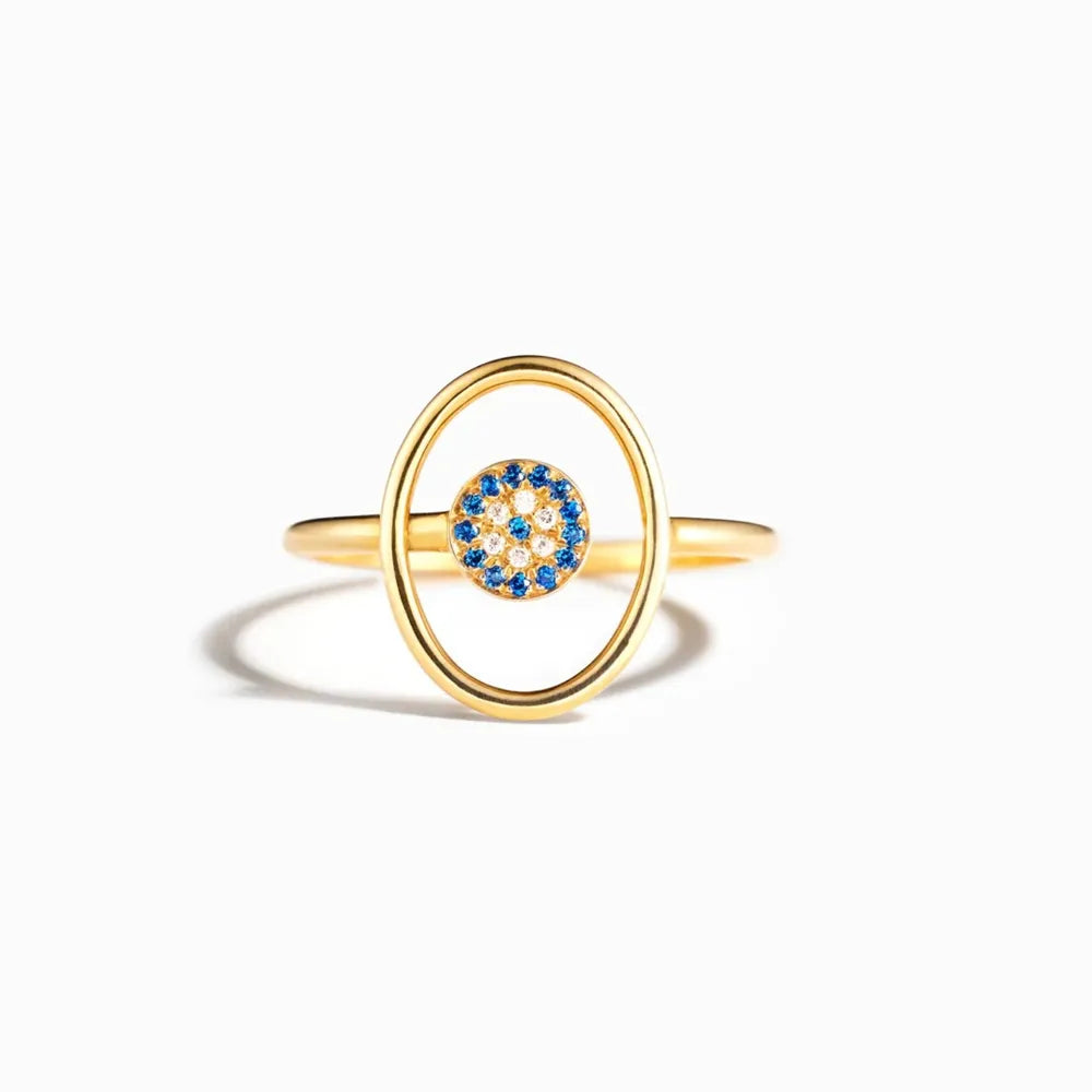 Gold oval ring with blue and white evil eye detail