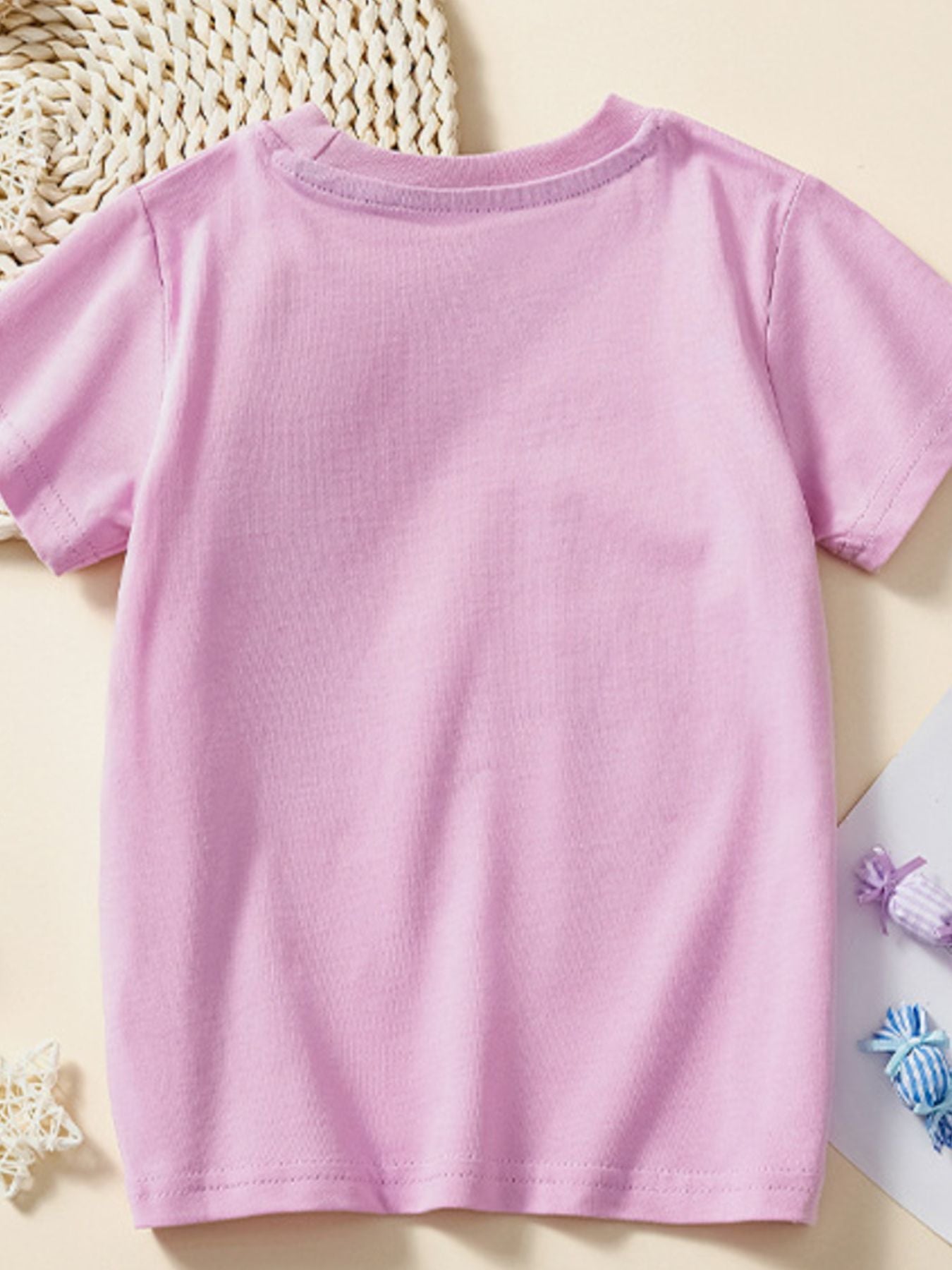 Toddler lilac cotton crew neck t-shirt with short sleeves.
