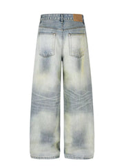 Men's light blue wide leg denim jeans with distressed wash and classic back pockets.