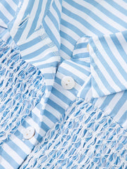 Blue and white striped button-down shirt with shirred bodice and collar detail.