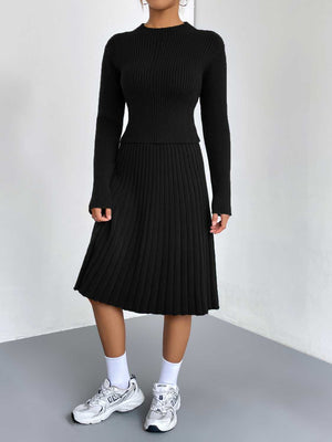 Black ribbed knit fit-and-flare co-ord set with long sleeves and a mock neck.