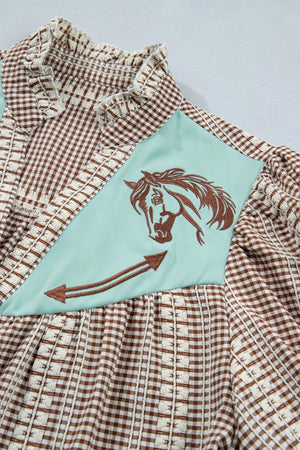 Brown gingham maternity shirt with embroidered horse yoke and puff sleeves.