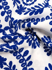Floral tie skort with slit in blue and white print.