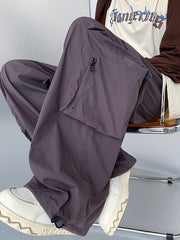 Men's cargo sweatpants in Mauve with zippered pocket detail and drawstring hem.