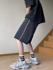 Men's black wide-leg denim shorts with side stripe detail and drawstring waist.