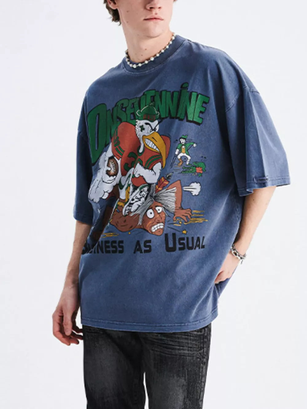 Sapphire blue oversized cotton tee with vintage eagle graphic and text.