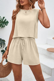 Beige textured crop top and shorts set with adjustable drawstring shorts