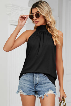 Black halter neck tank top with gathered neckline and bow detail at back
