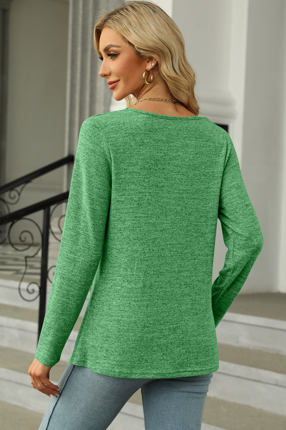 Green long sleeve blouse with square neck and button detail