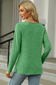 Green long sleeve blouse with square neck and button detail