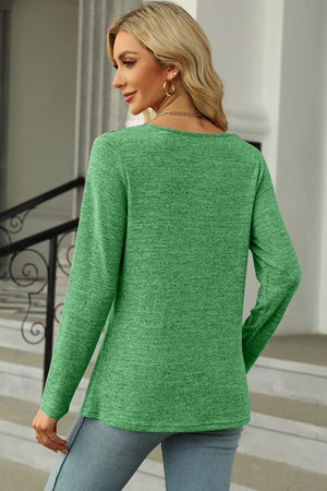 Green long sleeve blouse with square neck and button detail