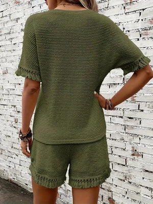 Moss green knit set with fringe detail on short sleeves and hem.