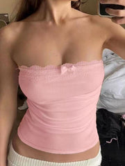 Ribbed knit bandeau top in blush pink with lace trim and a bow detail